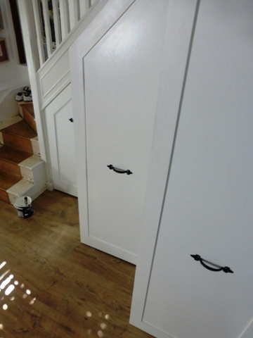 narrowest hallway ever for successfull installation of under stairs storage